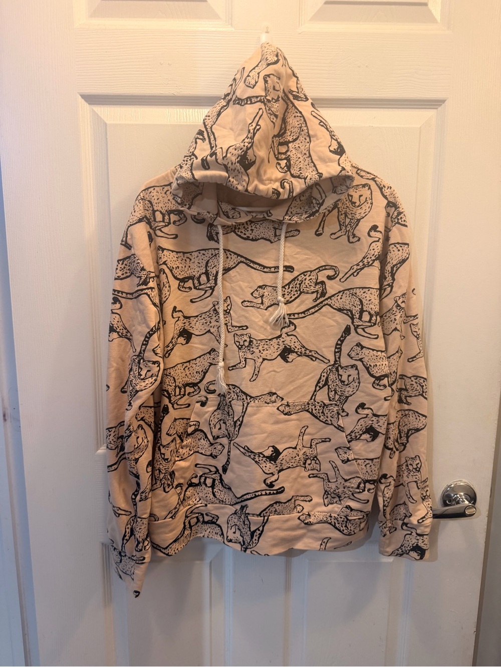 Patagonia Beige Hoodie with Black Cheetah Print